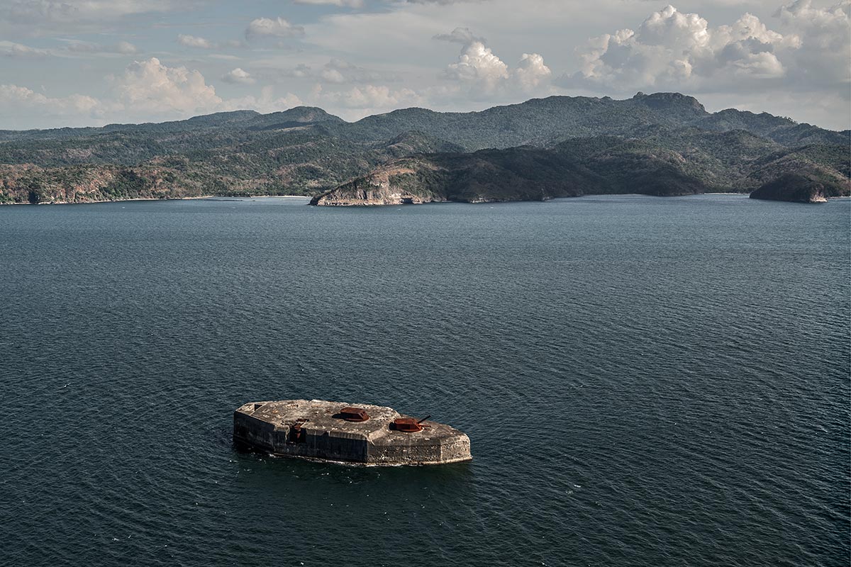 concrete battleship, rest in peace #71, philippines, 2014 (built in 1909 by the USA it was catured by Japan in 1942 before the USA recaptured it in 1945 by pouring gasoline and igniting it)